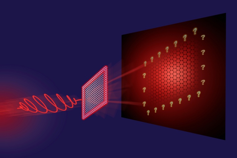 Abb.: Ein intensiver Laser beleuchtet ein topo­logisches Material, aber es...